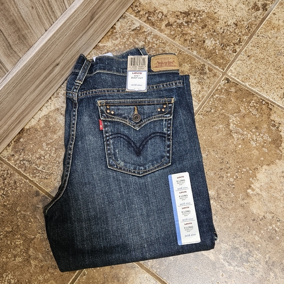 Levi's I  515 Mid Rise Boot Cut Jeans. - Picture 4 of 11